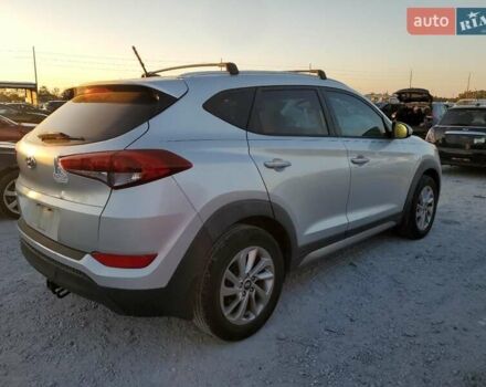 Серый Хендай Туксон, объемом двигателя 2 л и пробегом 111 тыс. км за 2400 $, фото 2 на Automoto.ua
