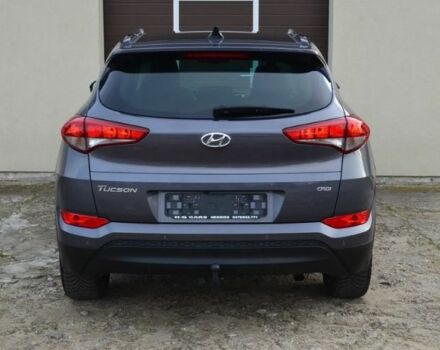 Серый Хендай Туксон, объемом двигателя 1.69 л и пробегом 165 тыс. км за 9600 $, фото 4 на Automoto.ua