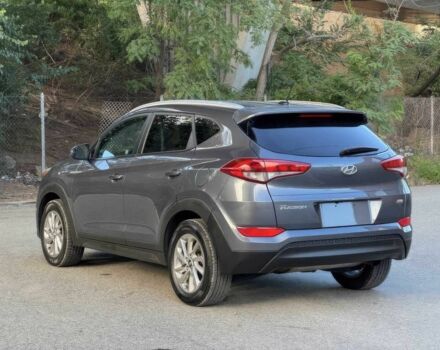 Сірий Хендай Туксон, об'ємом двигуна 2 л та пробігом 77 тис. км за 13300 $, фото 4 на Automoto.ua