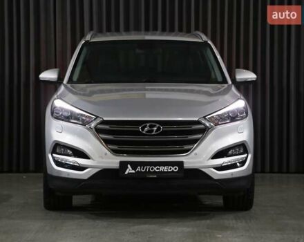 Серый Хендай Туксон, объемом двигателя 2 л и пробегом 126 тыс. км за 19400 $, фото 1 на Automoto.ua