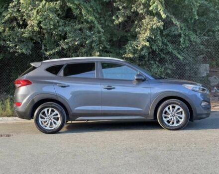 Сірий Хендай Туксон, об'ємом двигуна 2 л та пробігом 77 тис. км за 13300 $, фото 7 на Automoto.ua