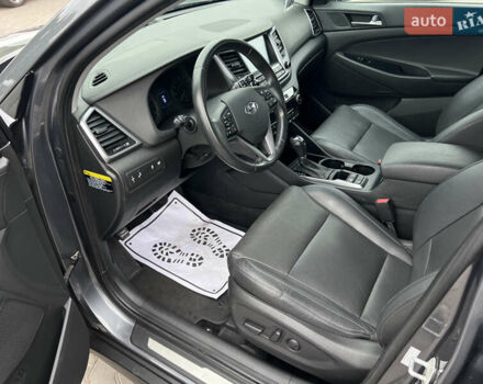 Серый Хендай Туксон, объемом двигателя 1.6 л и пробегом 188 тыс. км за 15990 $, фото 23 на Automoto.ua