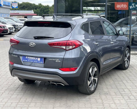 Серый Хендай Туксон, объемом двигателя 1.6 л и пробегом 188 тыс. км за 15990 $, фото 14 на Automoto.ua