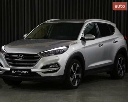 Серый Хендай Туксон, объемом двигателя 2 л и пробегом 126 тыс. км за 19400 $, фото 2 на Automoto.ua