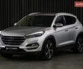 Серый Хендай Туксон, объемом двигателя 2 л и пробегом 126 тыс. км за 19400 $, фото 2 на Automoto.ua