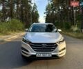 Серый Хендай Туксон, объемом двигателя 2 л и пробегом 58 тыс. км за 17500 $, фото 1 на Automoto.ua