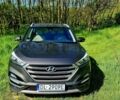 Сірий Хендай Туксон, об'ємом двигуна 2 л та пробігом 142 тис. км за 10700 $, фото 1 на Automoto.ua
