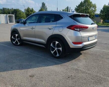 Серый Хендай Туксон, объемом двигателя 2 л и пробегом 148 тыс. км за 19500 $, фото 2 на Automoto.ua