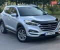 Серый Хендай Туксон, объемом двигателя 2 л и пробегом 210 тыс. км за 15400 $, фото 1 на Automoto.ua