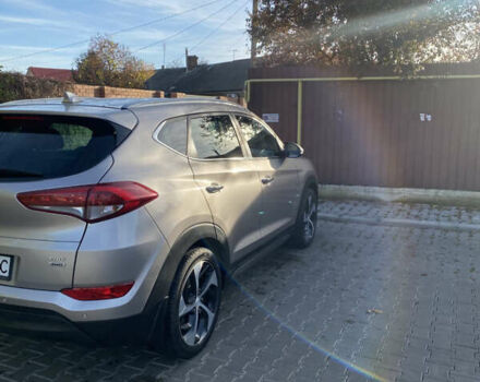 Серый Хендай Туксон, объемом двигателя 2 л и пробегом 168 тыс. км за 19000 $, фото 3 на Automoto.ua