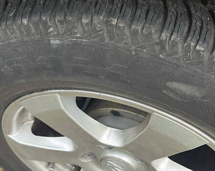 Серый Хендай Туксон, объемом двигателя 2 л и пробегом 192 тыс. км за 7777 $, фото 9 на Automoto.ua