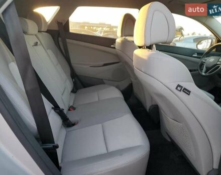 Серый Хендай Туксон, объемом двигателя 2 л и пробегом 111 тыс. км за 2400 $, фото 10 на Automoto.ua