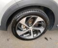 Серый Хендай Туксон, объемом двигателя 1.6 л и пробегом 74 тыс. км за 3900 $, фото 9 на Automoto.ua