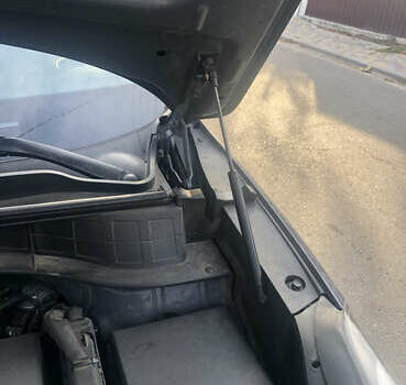 Серый Хендай Туксон, объемом двигателя 2 л и пробегом 166 тыс. км за 20500 $, фото 4 на Automoto.ua