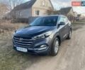 Серый Хендай Туксон, объемом двигателя 2 л и пробегом 156 тыс. км за 17000 $, фото 1 на Automoto.ua
