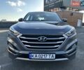 Серый Хендай Туксон, объемом двигателя 2 л и пробегом 124 тыс. км за 16900 $, фото 1 на Automoto.ua