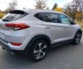 Серый Хендай Туксон, объемом двигателя 1.6 л и пробегом 74 тыс. км за 3900 $, фото 3 на Automoto.ua