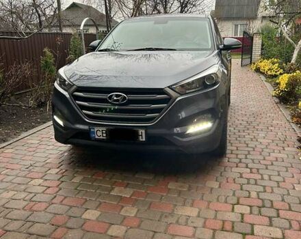 Серый Хендай Туксон, объемом двигателя 2 л и пробегом 158 тыс. км за 15999 $, фото 3 на Automoto.ua