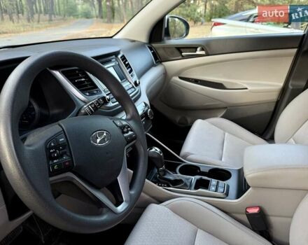 Серый Хендай Туксон, объемом двигателя 2 л и пробегом 58 тыс. км за 17500 $, фото 14 на Automoto.ua