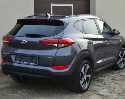 Серый Хендай Туксон, объемом двигателя 1.69 л и пробегом 165 тыс. км за 9600 $, фото 3 на Automoto.ua