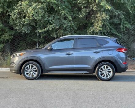 Сірий Хендай Туксон, об'ємом двигуна 2 л та пробігом 77 тис. км за 13300 $, фото 3 на Automoto.ua