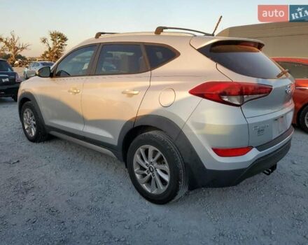 Серый Хендай Туксон, объемом двигателя 2 л и пробегом 111 тыс. км за 2400 $, фото 1 на Automoto.ua