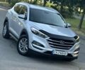 Серый Хендай Туксон, объемом двигателя 2 л и пробегом 210 тыс. км за 15400 $, фото 3 на Automoto.ua
