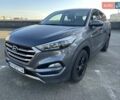 Серый Хендай Туксон, объемом двигателя 2 л и пробегом 124 тыс. км за 16900 $, фото 4 на Automoto.ua