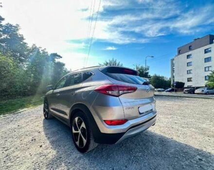 Серый Хендай Туксон, объемом двигателя 2.4 л и пробегом 94 тыс. км за 10700 $, фото 5 на Automoto.ua