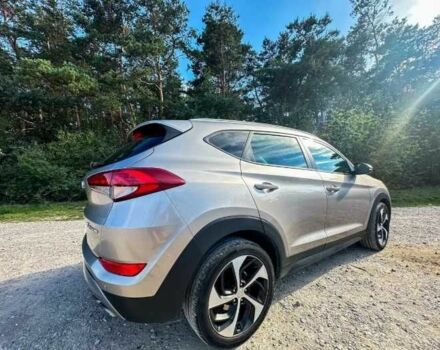 Серый Хендай Туксон, объемом двигателя 2.4 л и пробегом 94 тыс. км за 10700 $, фото 7 на Automoto.ua