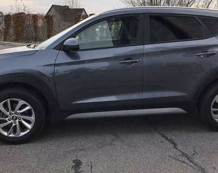 Серый Хендай Туксон, объемом двигателя 2 л и пробегом 130 тыс. км за 14400 $, фото 3 на Automoto.ua