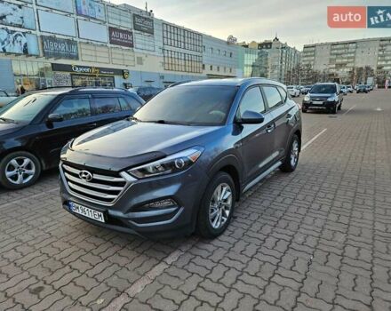 Серый Хендай Туксон, объемом двигателя 2 л и пробегом 134 тыс. км за 14600 $, фото 2 на Automoto.ua