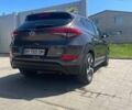 Серый Хендай Туксон, объемом двигателя 2 л и пробегом 124 тыс. км за 20600 $, фото 4 на Automoto.ua