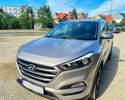 Серый Хендай Туксон, объемом двигателя 2.4 л и пробегом 94 тыс. км за 10700 $, фото 1 на Automoto.ua