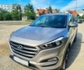 Серый Хендай Туксон, объемом двигателя 2.4 л и пробегом 94 тыс. км за 10700 $, фото 1 на Automoto.ua