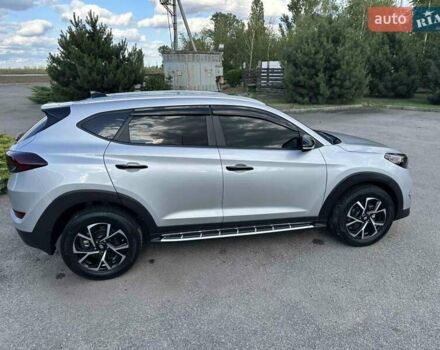Сірий Хендай Туксон, об'ємом двигуна 2 л та пробігом 43 тис. км за 19000 $, фото 45 на Automoto.ua