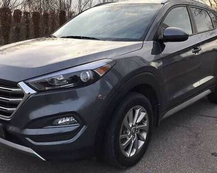 Серый Хендай Туксон, объемом двигателя 2 л и пробегом 130 тыс. км за 14400 $, фото 2 на Automoto.ua