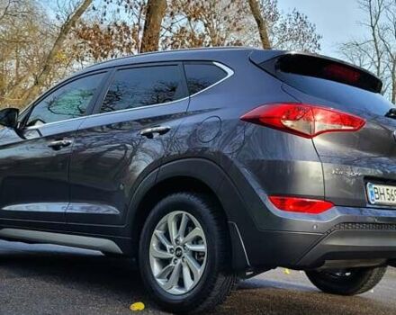 Серый Хендай Туксон, объемом двигателя 2 л и пробегом 19 тыс. км за 25000 $, фото 1 на Automoto.ua