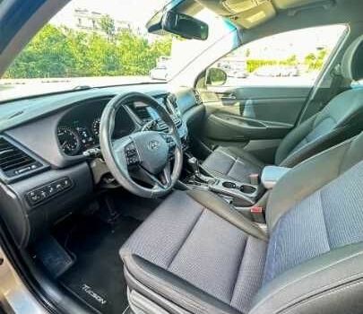 Серый Хендай Туксон, объемом двигателя 2.4 л и пробегом 94 тыс. км за 10700 $, фото 15 на Automoto.ua