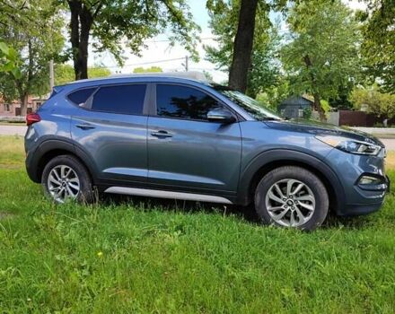 Сірий Хендай Туксон, об'ємом двигуна 2 л та пробігом 60 тис. км за 18200 $, фото 5 на Automoto.ua