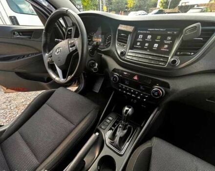 Серый Хендай Туксон, объемом двигателя 2.4 л и пробегом 94 тыс. км за 10700 $, фото 10 на Automoto.ua