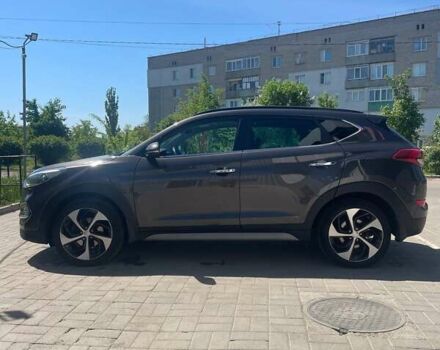 Серый Хендай Туксон, объемом двигателя 2 л и пробегом 124 тыс. км за 20600 $, фото 3 на Automoto.ua