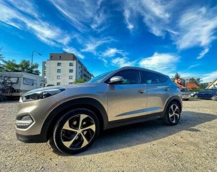 Серый Хендай Туксон, объемом двигателя 2.4 л и пробегом 94 тыс. км за 10700 $, фото 3 на Automoto.ua