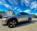 Серый Хендай Туксон, объемом двигателя 2.4 л и пробегом 94 тыс. км за 10700 $, фото 3 на Automoto.ua