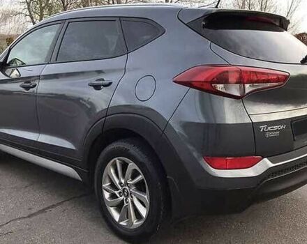 Серый Хендай Туксон, объемом двигателя 2 л и пробегом 130 тыс. км за 14400 $, фото 9 на Automoto.ua