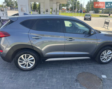 Серый Хендай Туксон, объемом двигателя 2 л и пробегом 118 тыс. км за 17200 $, фото 5 на Automoto.ua