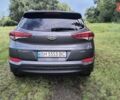 Серый Хендай Туксон, объемом двигателя 2 л и пробегом 133 тыс. км за 15300 $, фото 4 на Automoto.ua