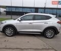 Сірий Хендай Туксон, об'ємом двигуна 2 л та пробігом 98 тис. км за 18500 $, фото 24 на Automoto.ua