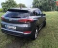 Серый Хендай Туксон, объемом двигателя 2 л и пробегом 133 тыс. км за 15300 $, фото 5 на Automoto.ua