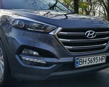 Серый Хендай Туксон, объемом двигателя 2 л и пробегом 19 тыс. км за 25000 $, фото 2 на Automoto.ua